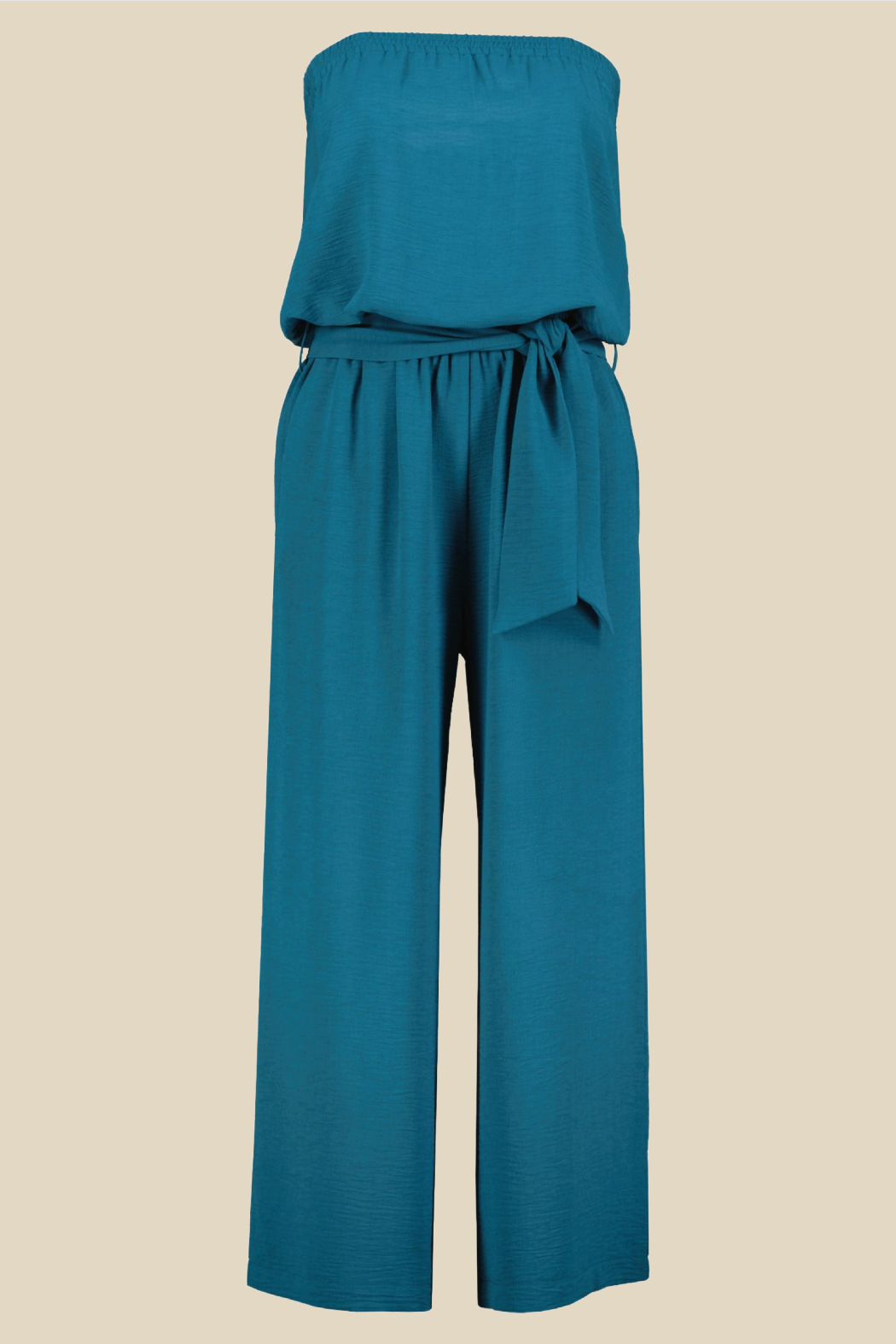 A teal blue two-piece jumpsuit set consisting of a strapless top and matching wide-leg pants with a tie waist, displayed on a solid beige background.